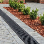 channel grate fitted onto driveway